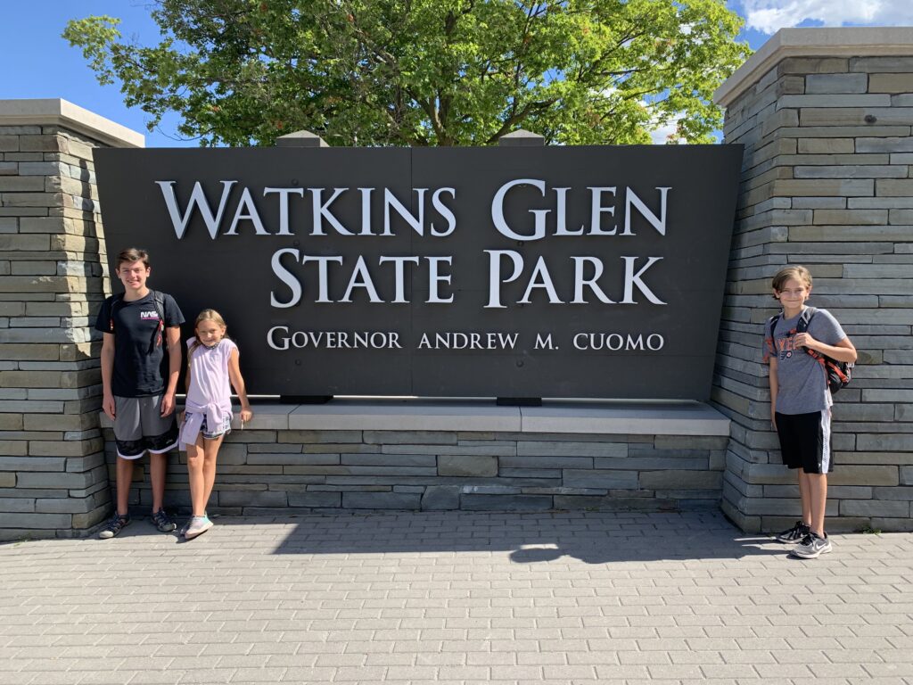 Kids at the Watkins Glen State Park sign