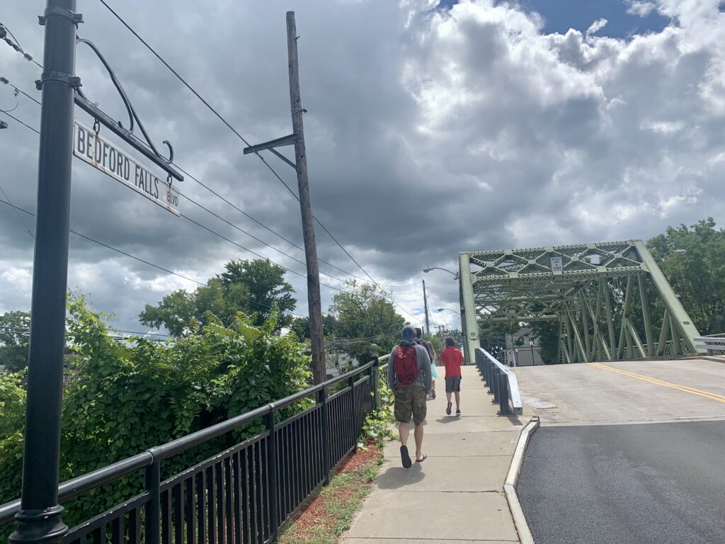 Walking across George Bailey Bridge in Senece Falls