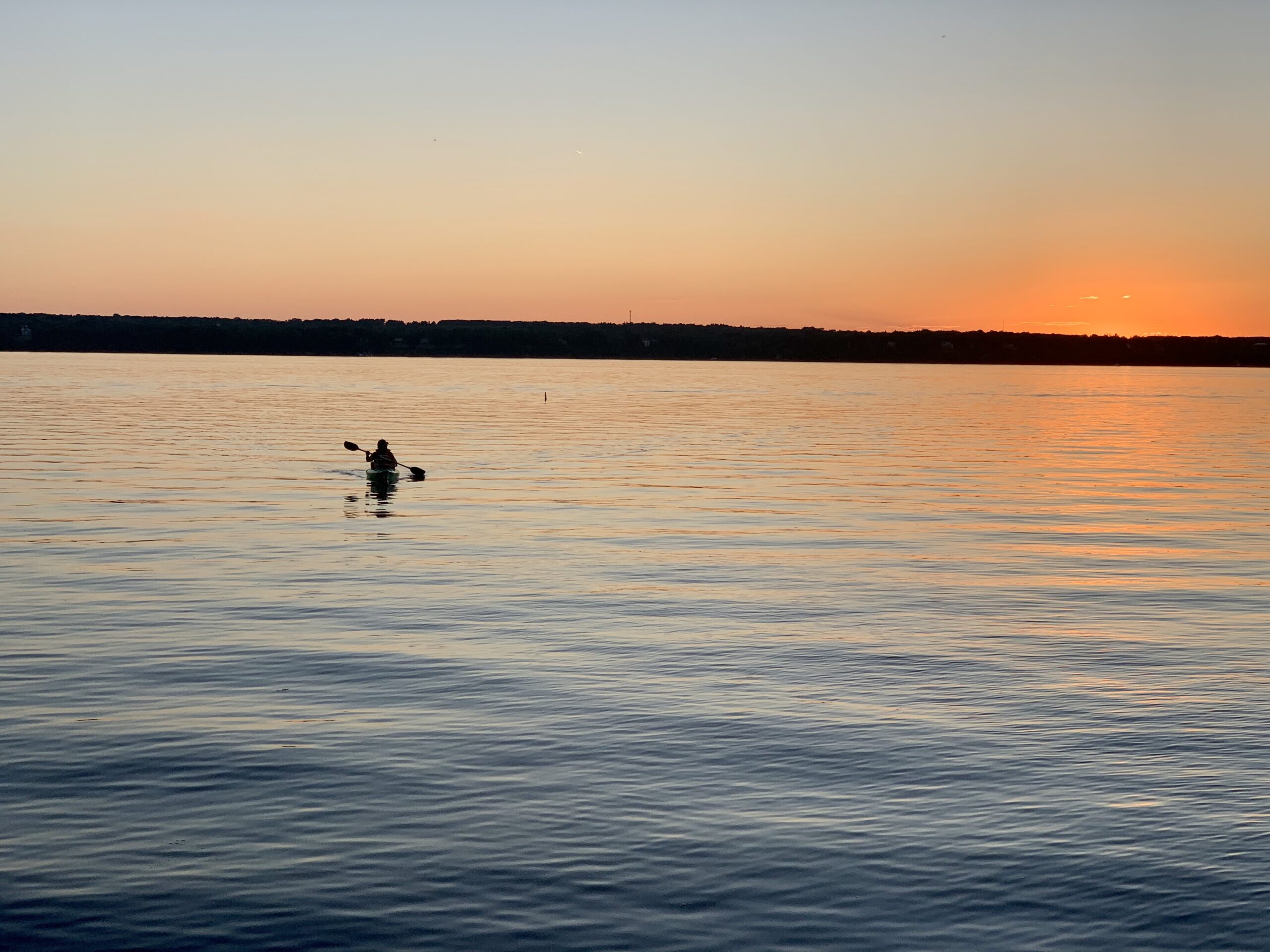 Kayaking at sunset on Seneca Lake