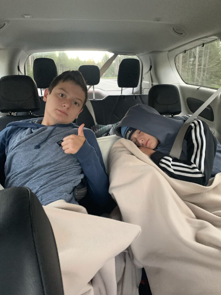Tired kids in the car at Yellowstone