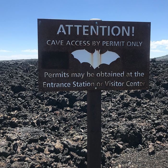 craters of the moon bat cave sign