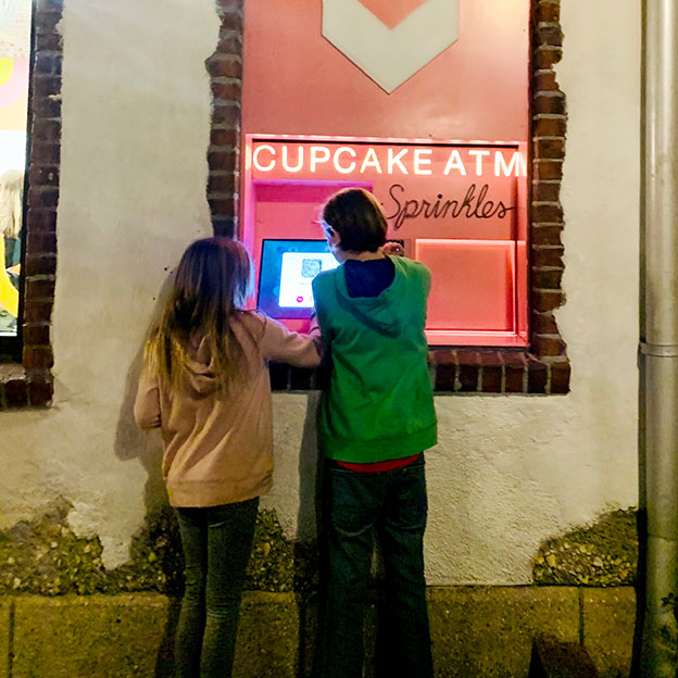 Checking out the Sprinkles Cupcake ATM in Disney Springs