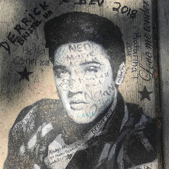 elvis painting graceland sidewalk