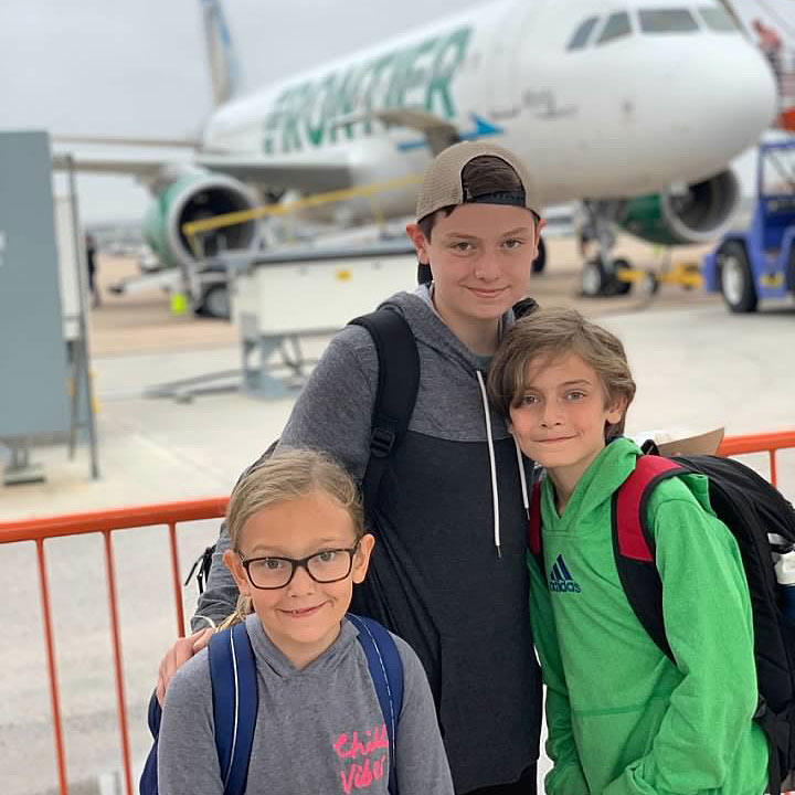 kids travel frontier airport