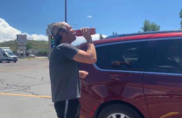 kevin drinking wine minivan